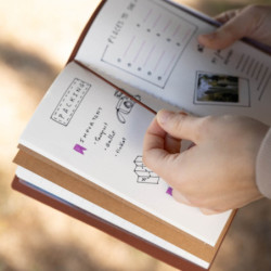 CUADERNO DE VIAJE C/GOMA ERIK REAL MADRID MARRON CTBV036