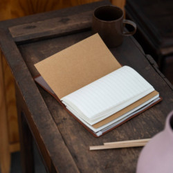 CUADERNO DE VIAJE C/GOMA ERIK REAL MADRID MARRON CTBV036